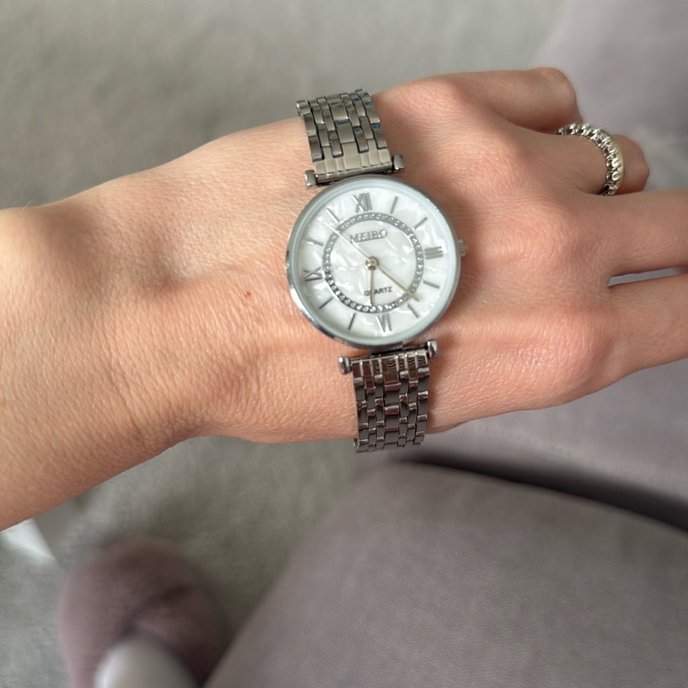 Silver watch, brand new.